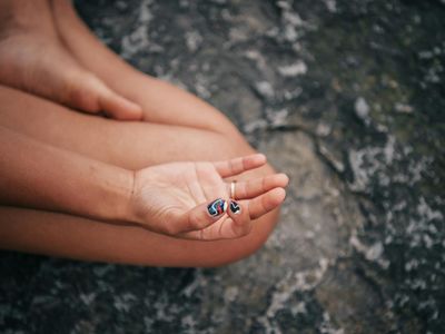 Close up of hands in a yoga mudra position